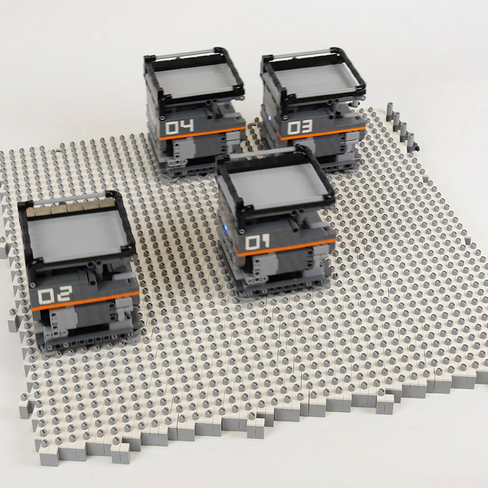 Omni-Directional Vehicles - 4x4 grid with 4 vehicles, by Akiyuki