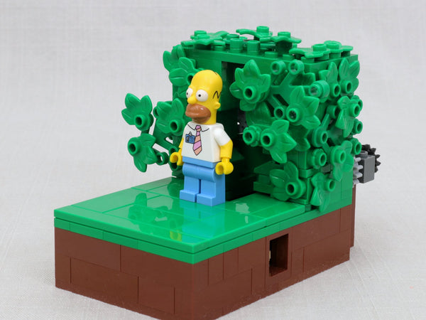 Homer desapareciendo entre los arbustos