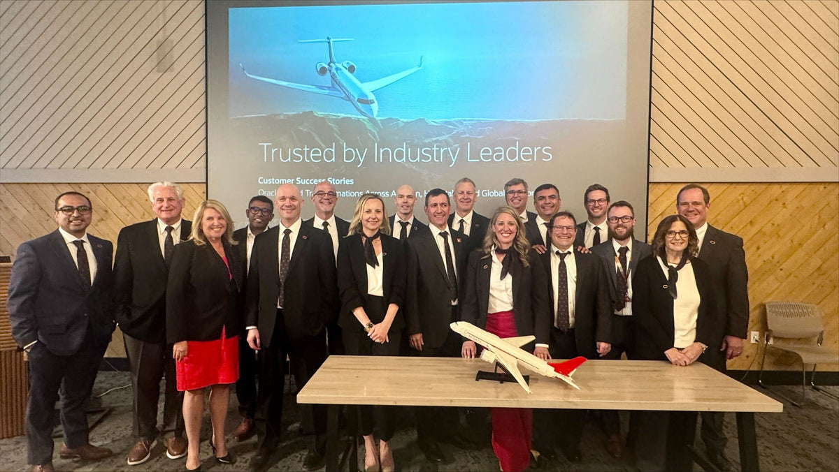Oracle NetJets Plane Display Model, group photograph with the plane at the customer event