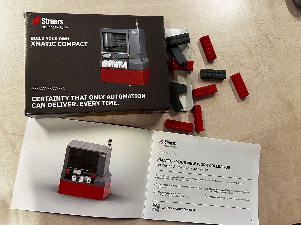 Struers Xmatic and Xmatic Compact Kits, the Xmatic Compact box and open instruction booklet