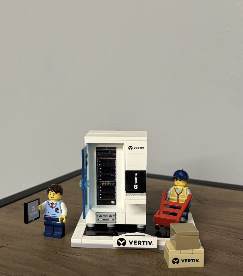 Physical Vertiv rack model with white cabinet and blue door.