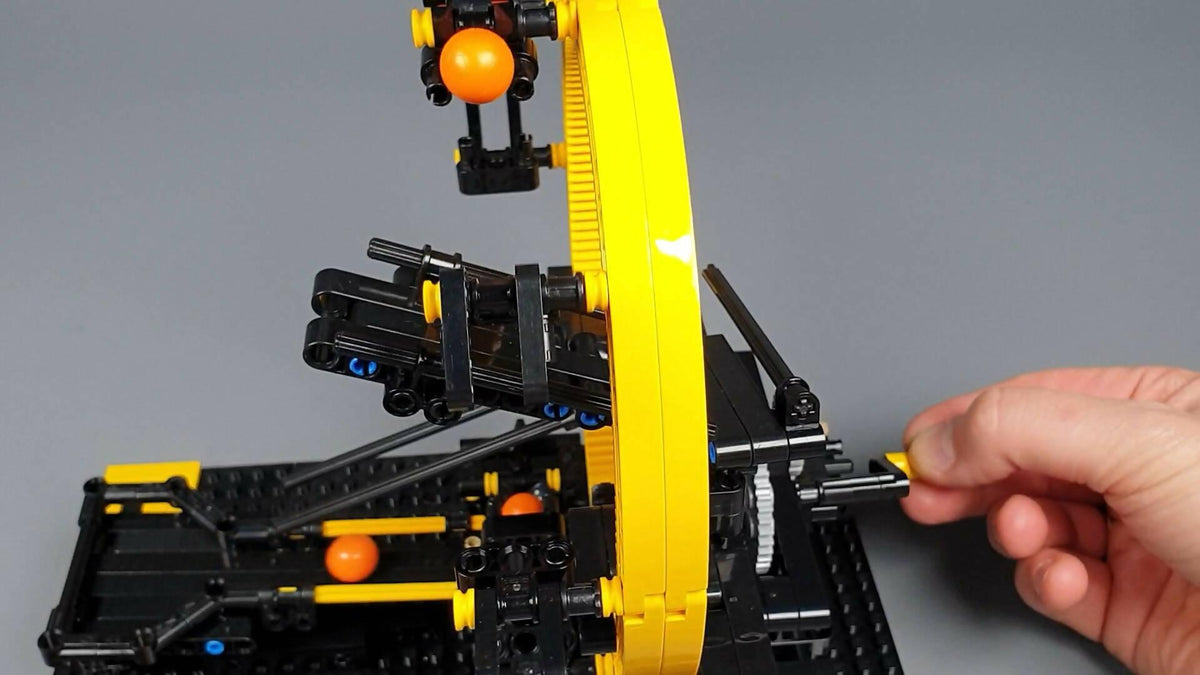 Rueda amarilla - Serie LEGO GBC Power Loop - #02 - BuildaMOC