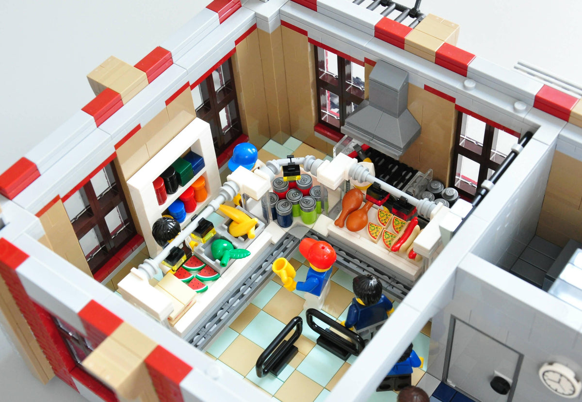 Modularer Wolkenkratzer „The Daily Stud“ - BuildaMOC